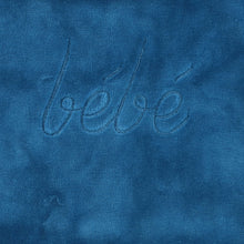 enlarged Bee & Dee indigo blue footie with bebe imprint